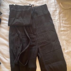 NANUSHKA crepe style trousers with belt bag